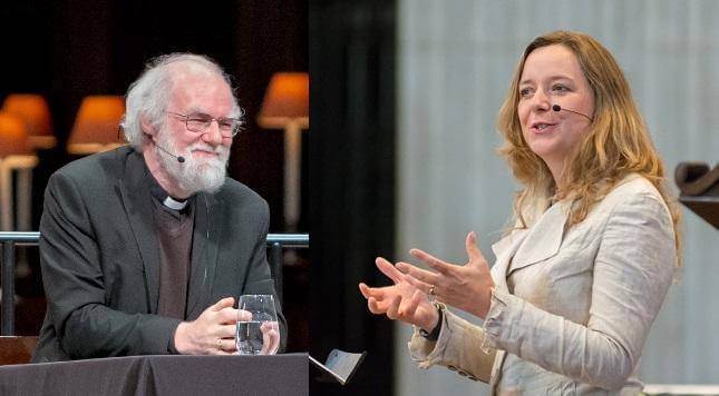 Rowan Williams sitting on stage with the lamps of the quire in the background alongside a picture of Paula Gooder, hands palm upwards in front of her, standing with a pillar and a corner of a wooden lectern in the background.