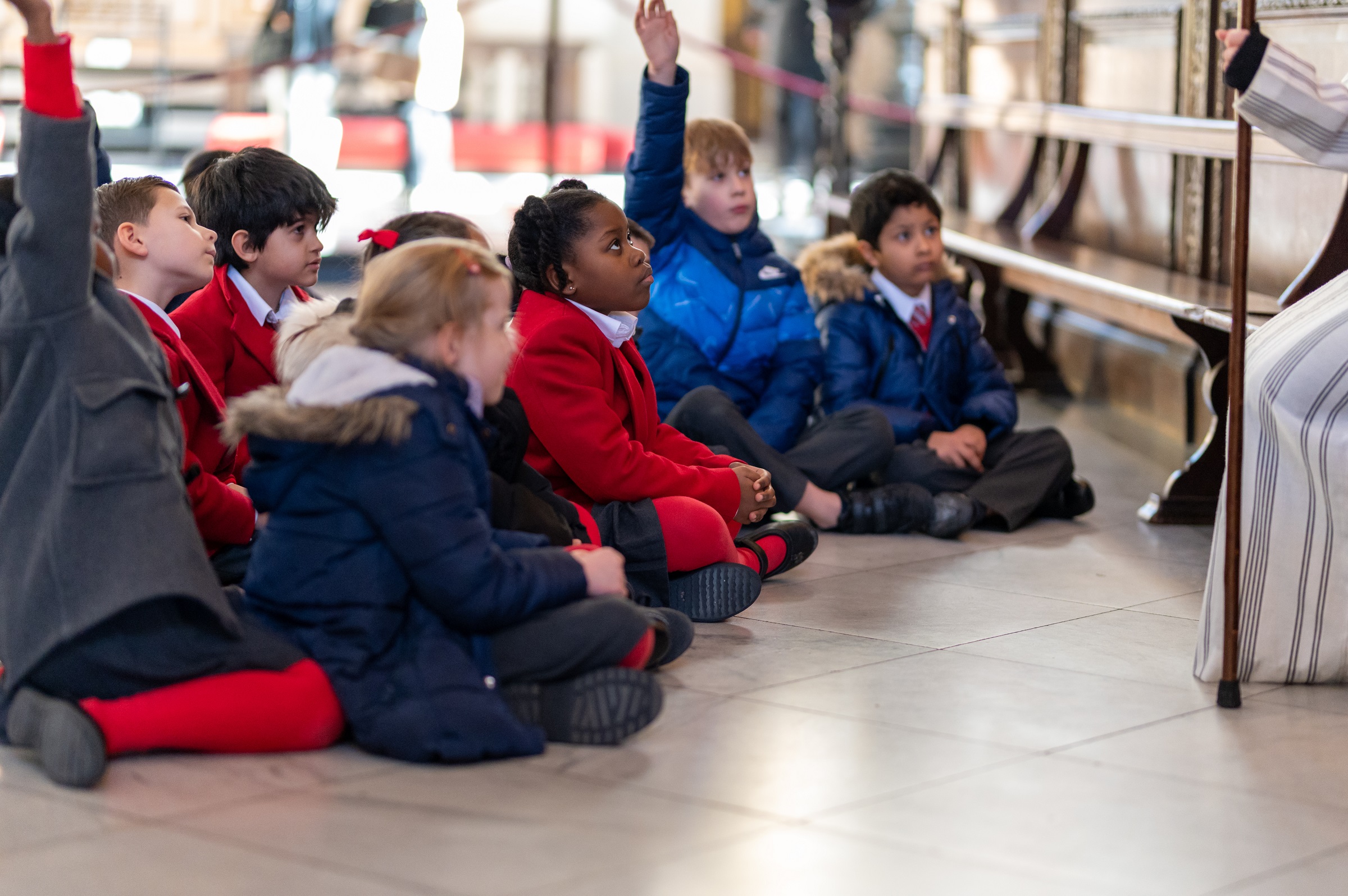 children school hands up engaged