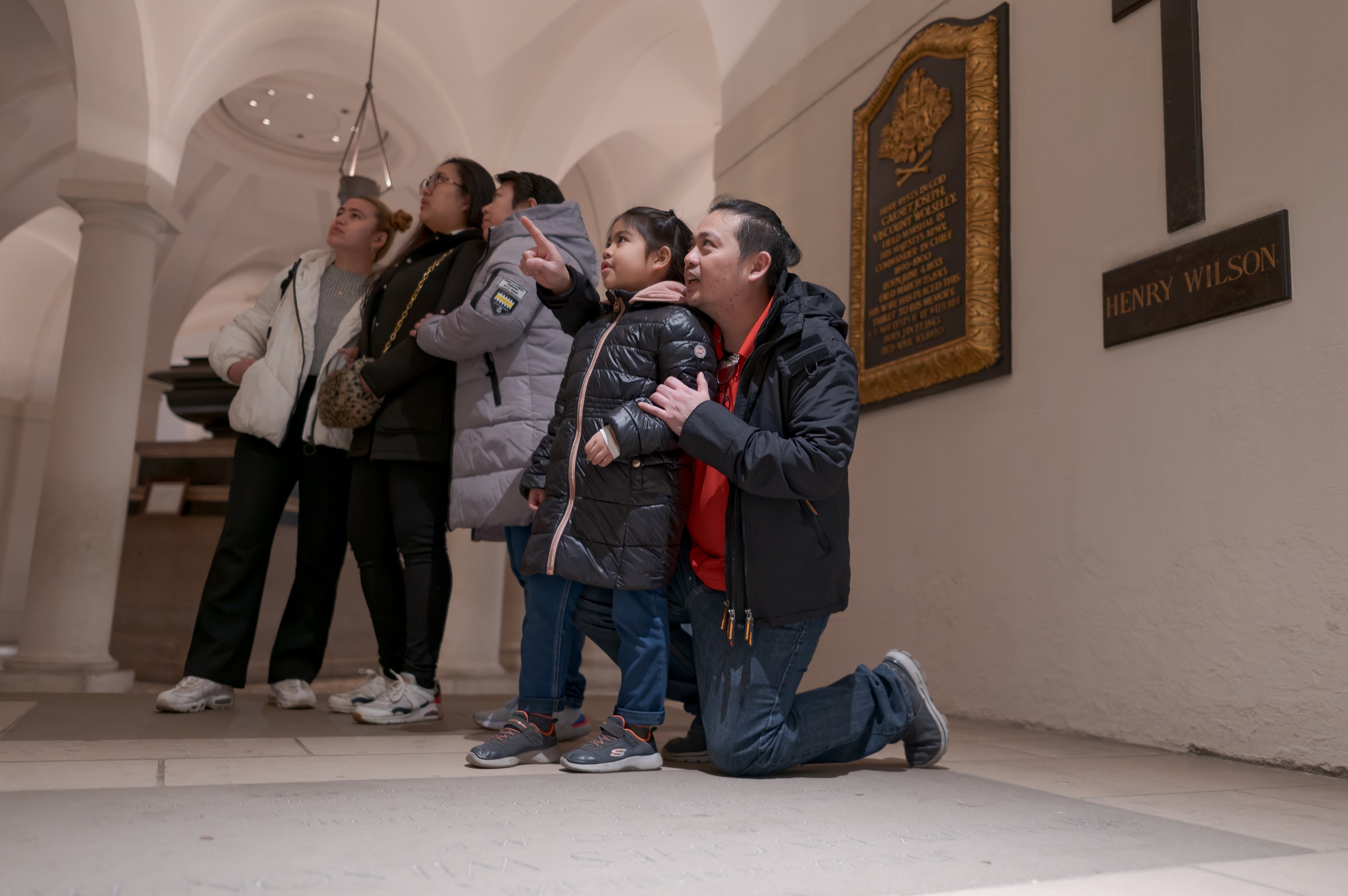 family exploring the crypt 