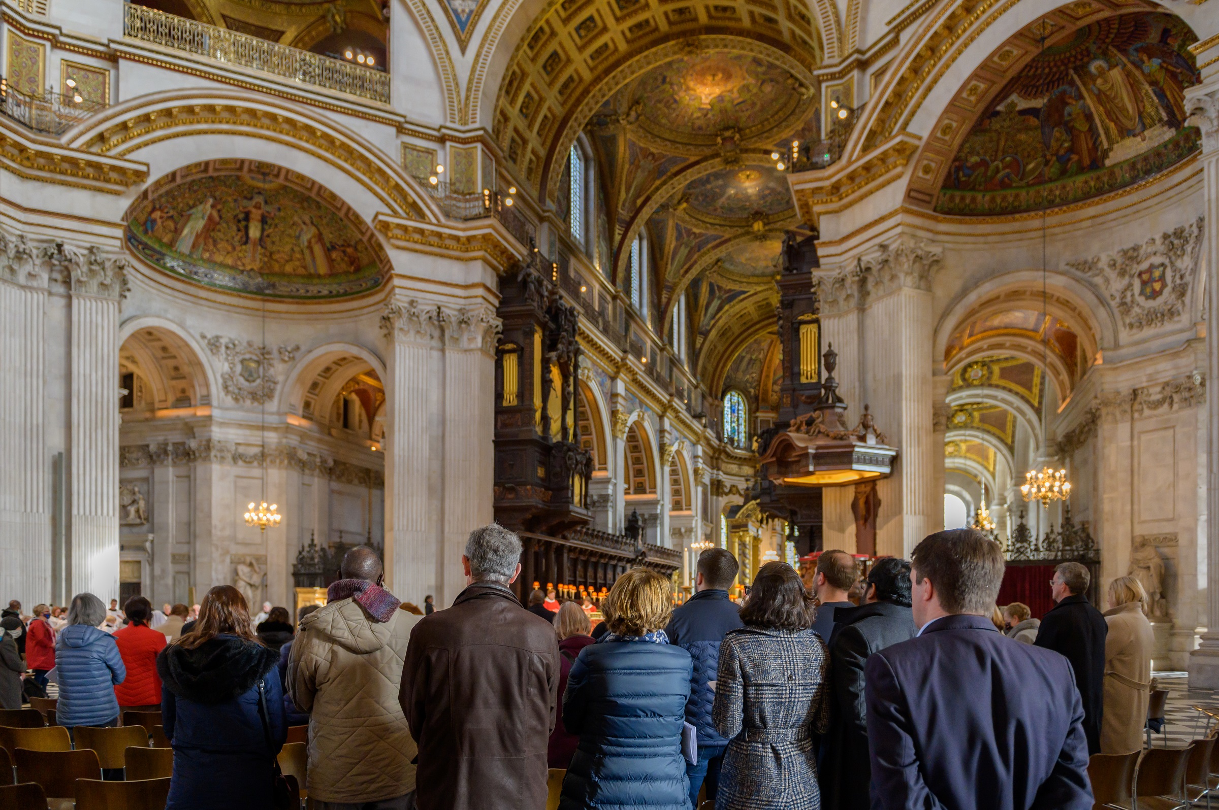 large congregation standing in the cathedral