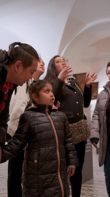 family exploring the crypt