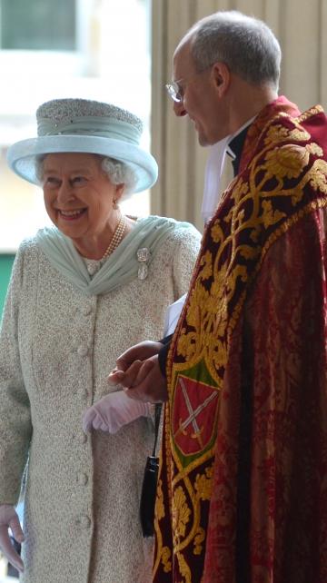 The Dean of St Paul's Cathedral greets Her Majesty the Queen on the steps of St Paul's Cathedral for her Diamond Jubilee service