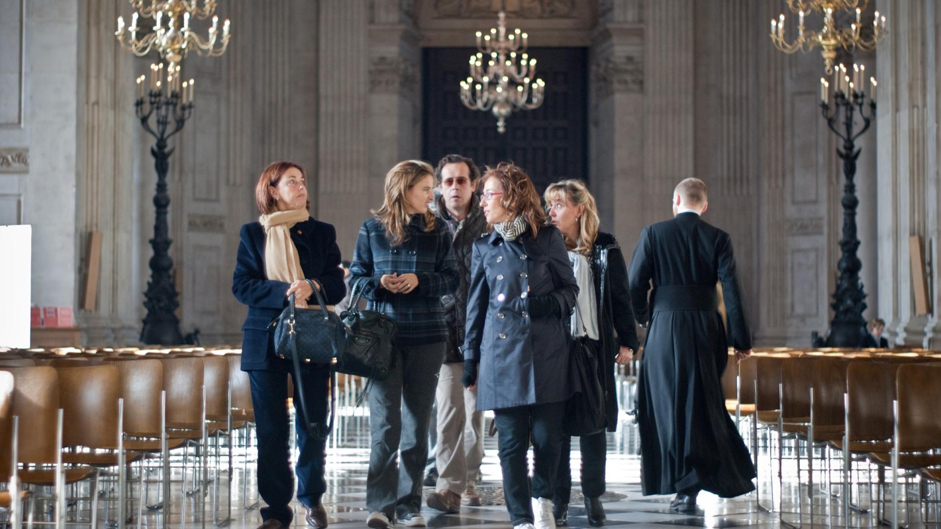 visitors walking the nave women tourists