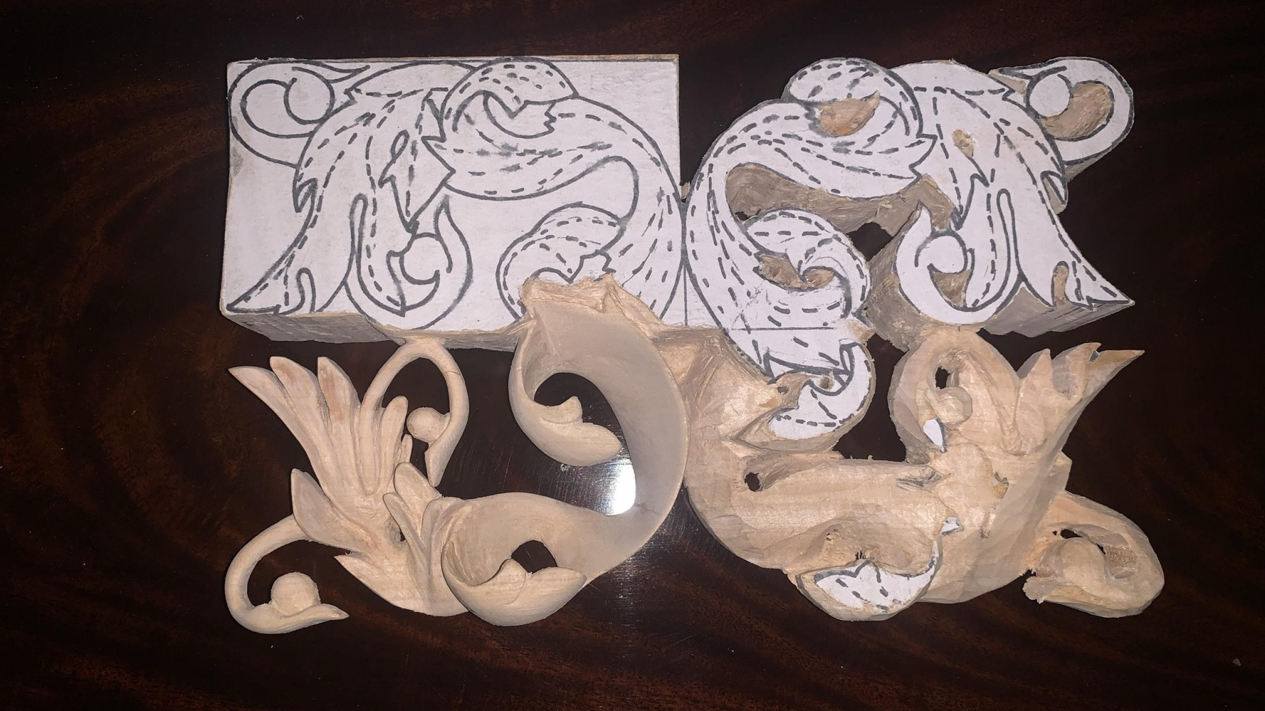 closeup of remade grindling gibbons carvings