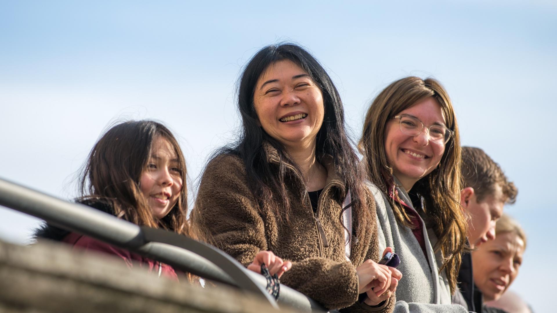 young women looking out from the top of the Dome