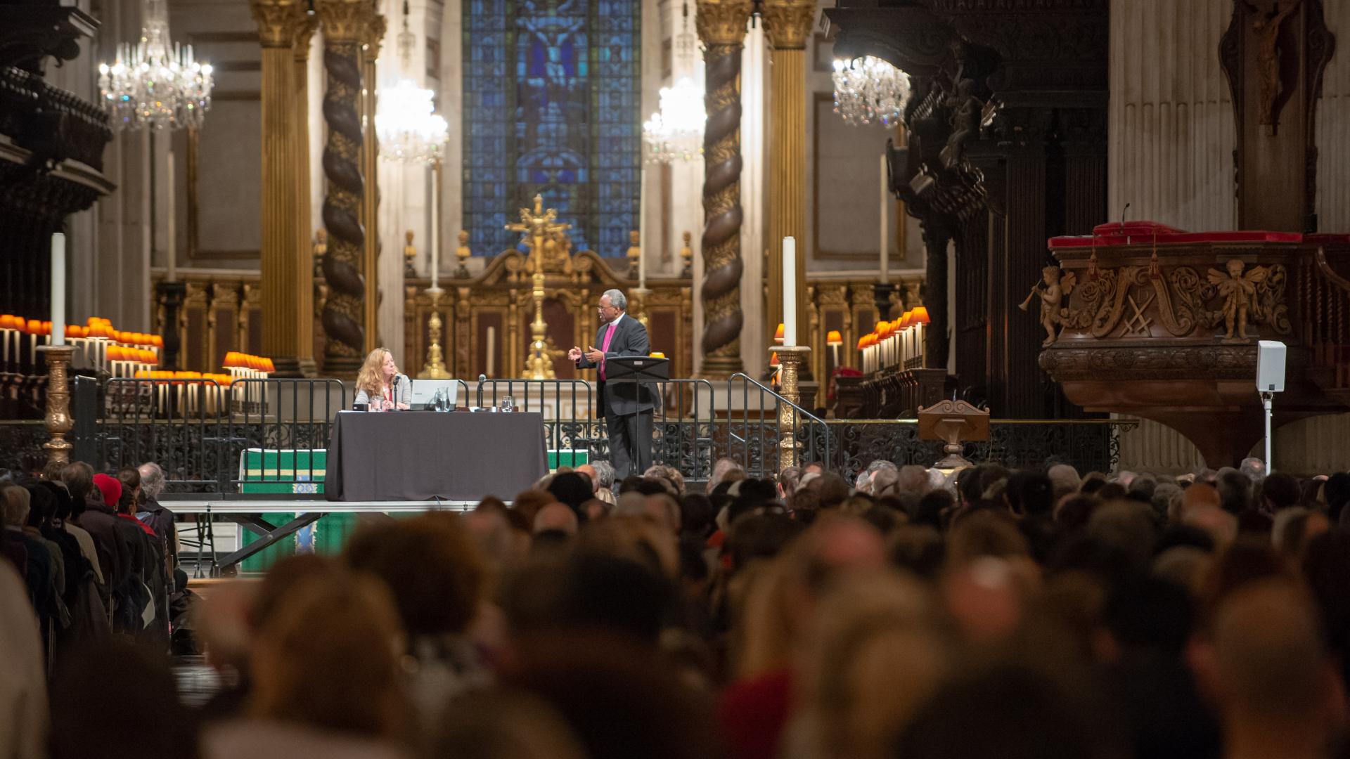 Bishop Curry and Paula Gooder on stage at an Adult Learning event in the cathedral