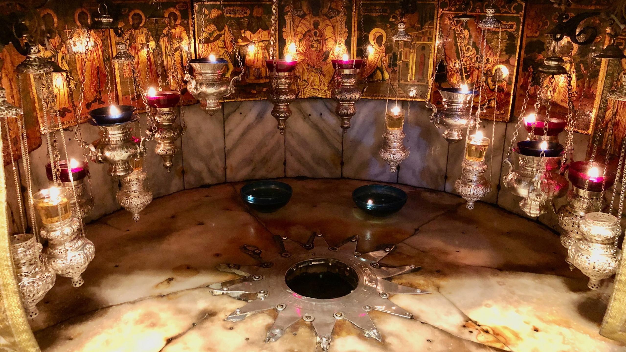 the fourteen pointed star which marks the traditional place of Jesus's birth