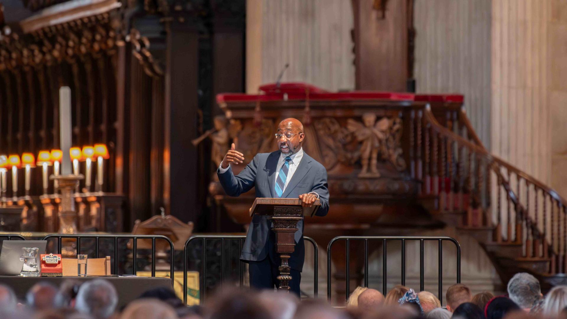 Revd Raphael Warnock speaks during a lecture