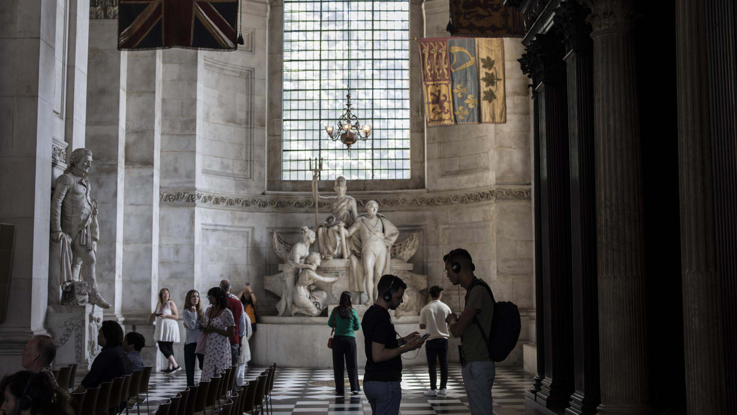 Visitors look around in the South Transept.