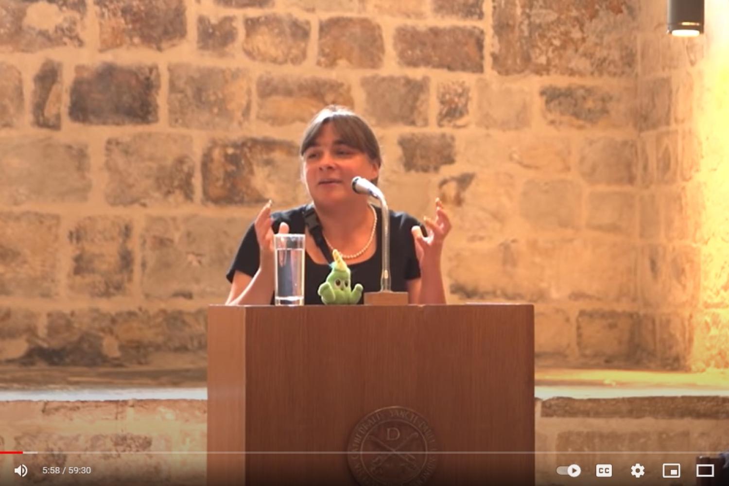 Eve Poole speaking in the Wren Suite at St Paul's Cathedral