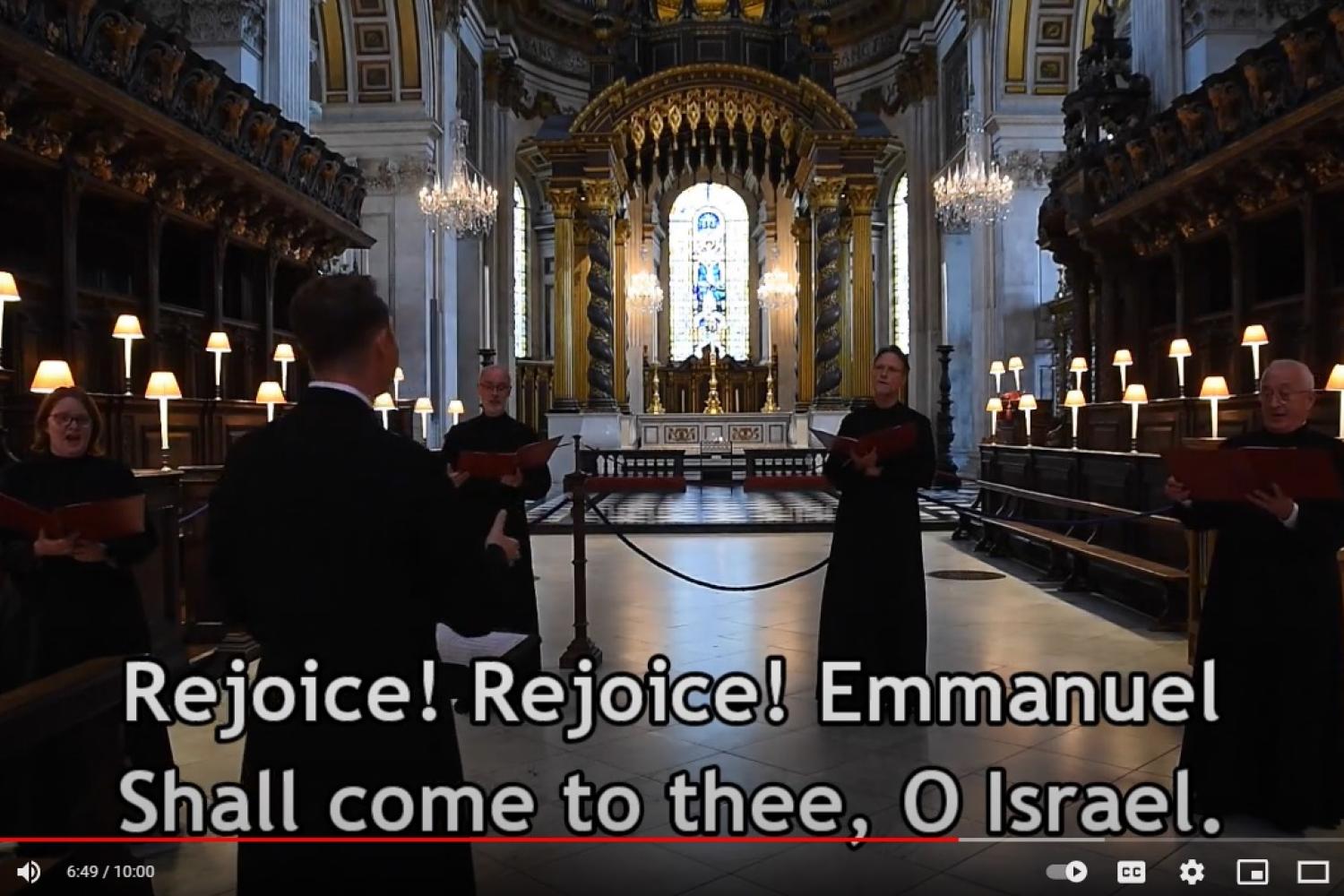 Members of the Vicars Choral singing in the Quire at St Paul's Cathedral