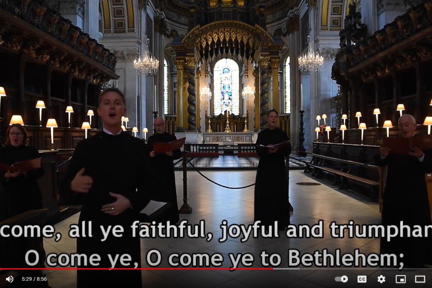 Members of the Vicars Choral singing in the Quire at St Paul's Cathedral