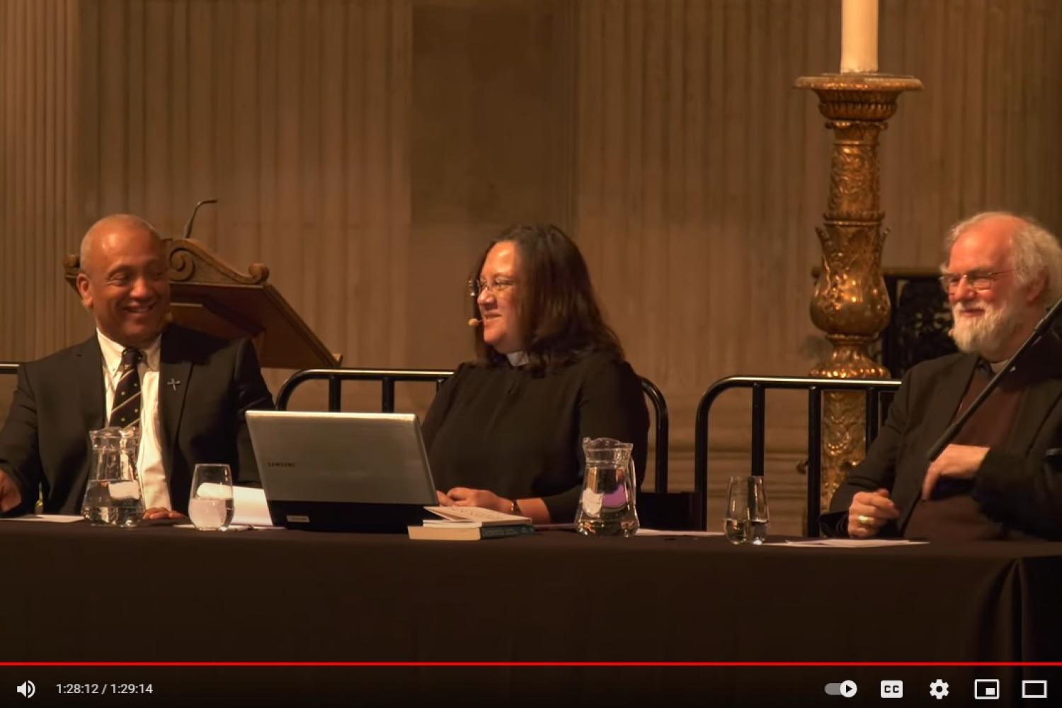 John Swinton, Rowan Williams and Tricia Hillas on stage at St Paul's Cathedral