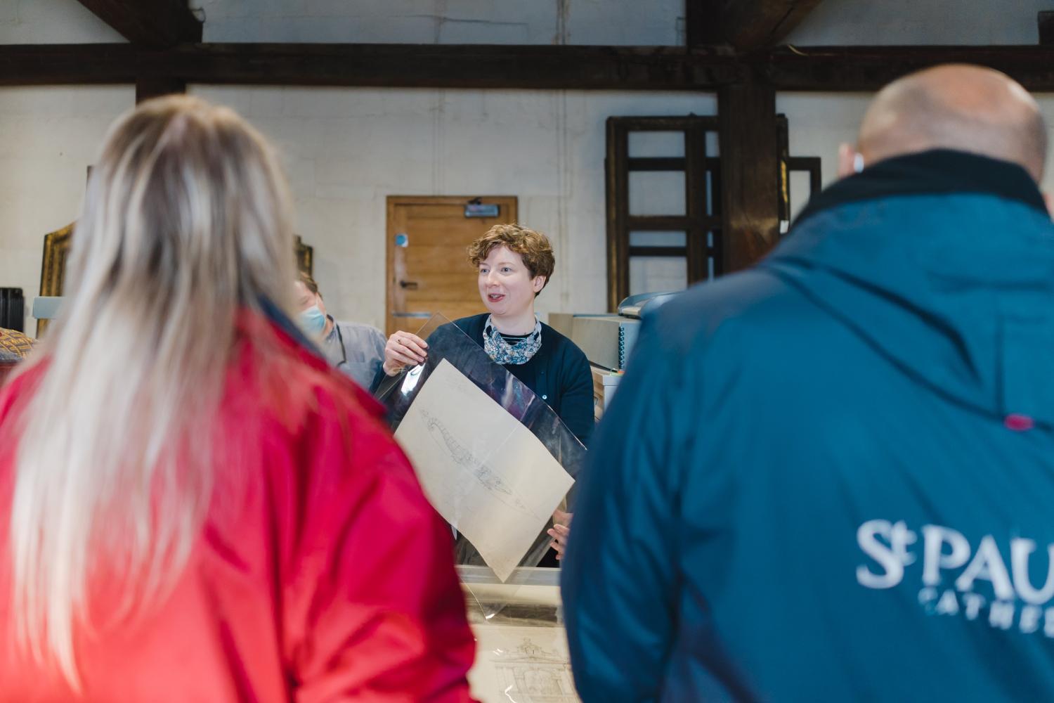 visitors being shown round the collections department