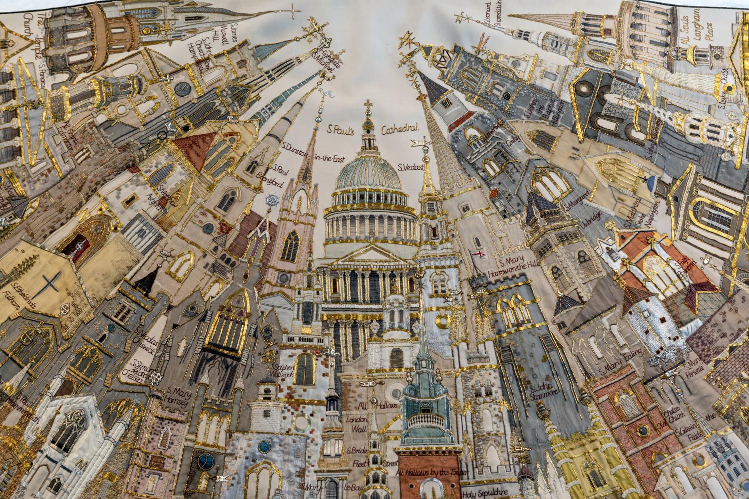 Close up of embroidery on Jubilee Cope depicting St Paul's and Diocese of London churches