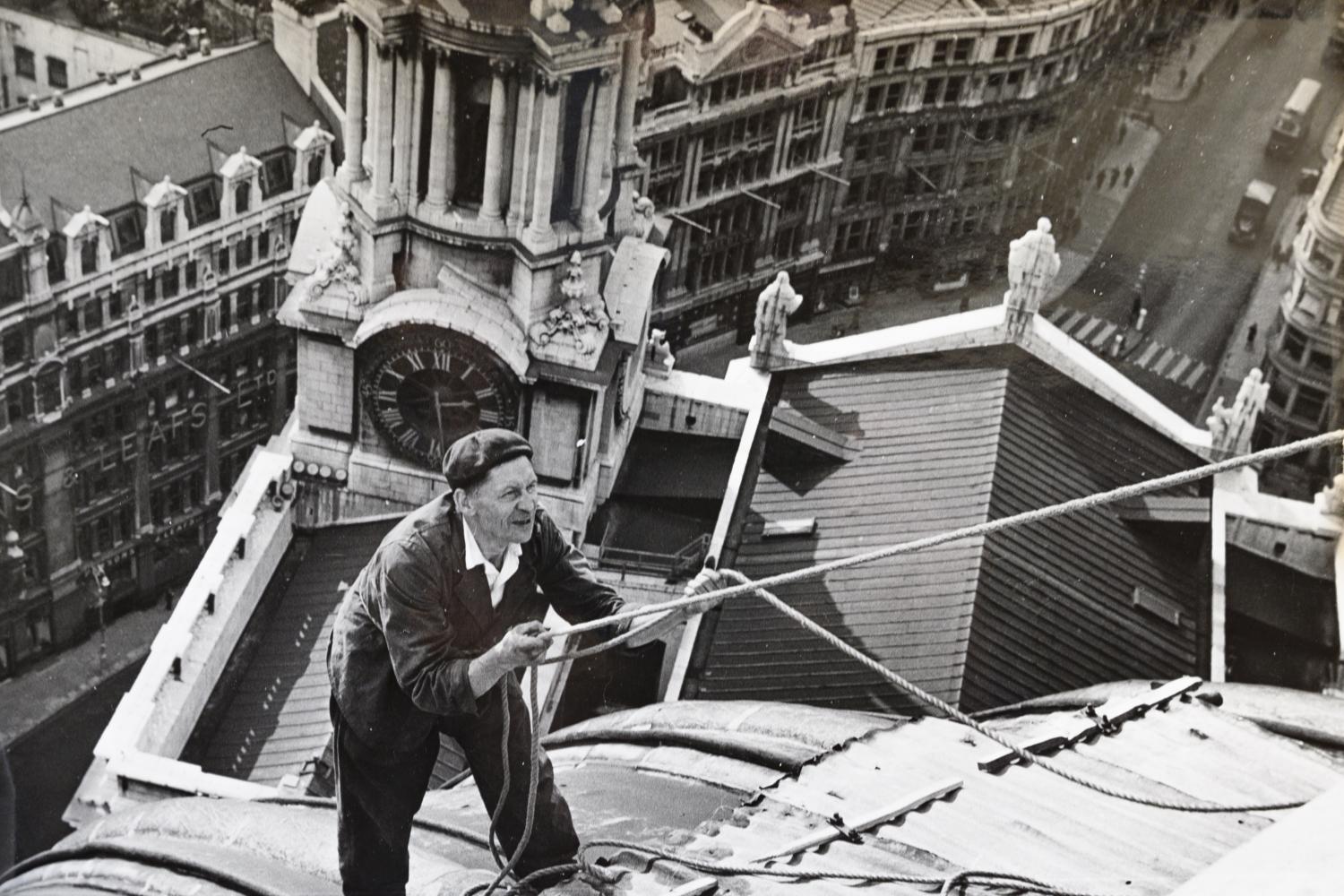 A Friend of St Paul's Cathedral working on the roof of the building