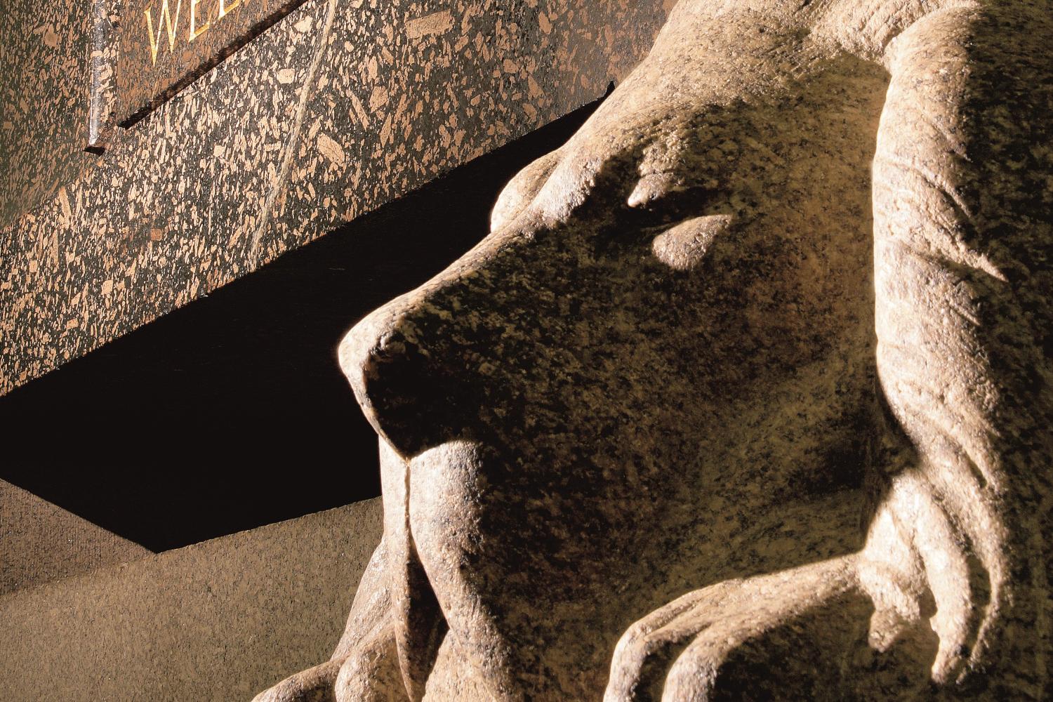 The granite lion supporting the tomb of the Duke of Wellington in the crypt