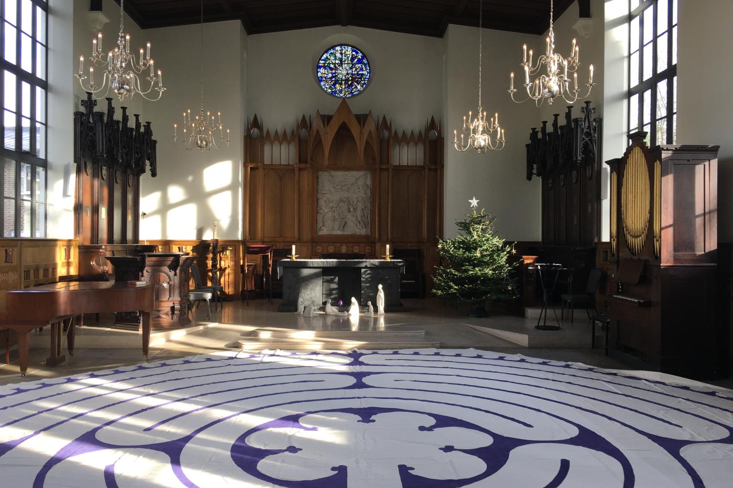 The interior of the Chapel at the Royal Foundation of St Katharine with a labyrinth laid out on the floor