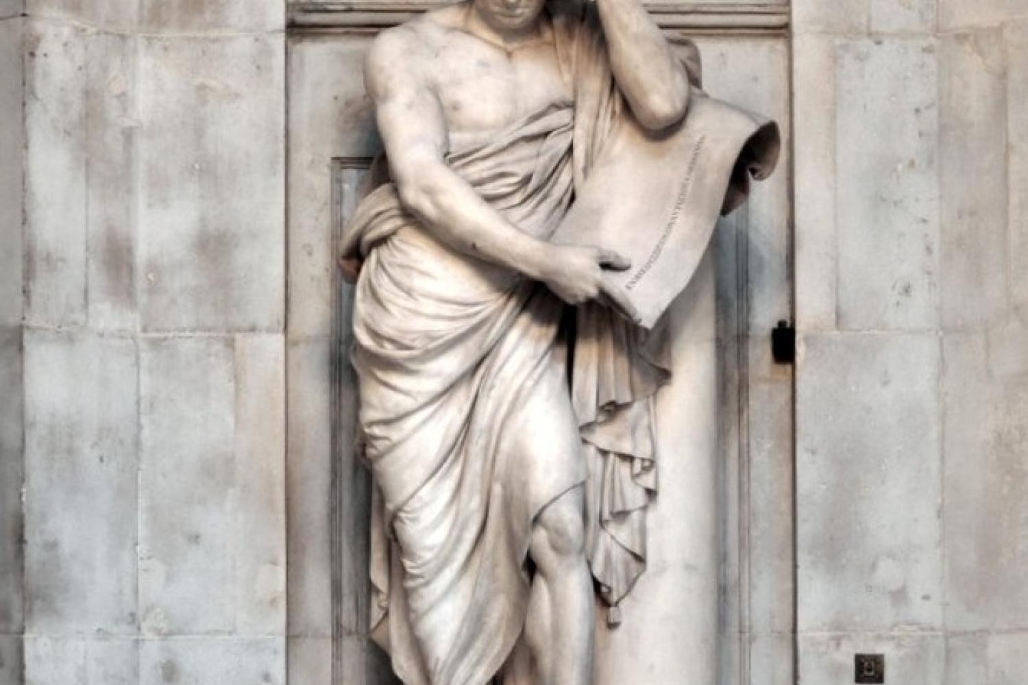 The monument to Samuel Johnson depicts him leaning on a column, dressed in antique drapes, and contemplating a scroll