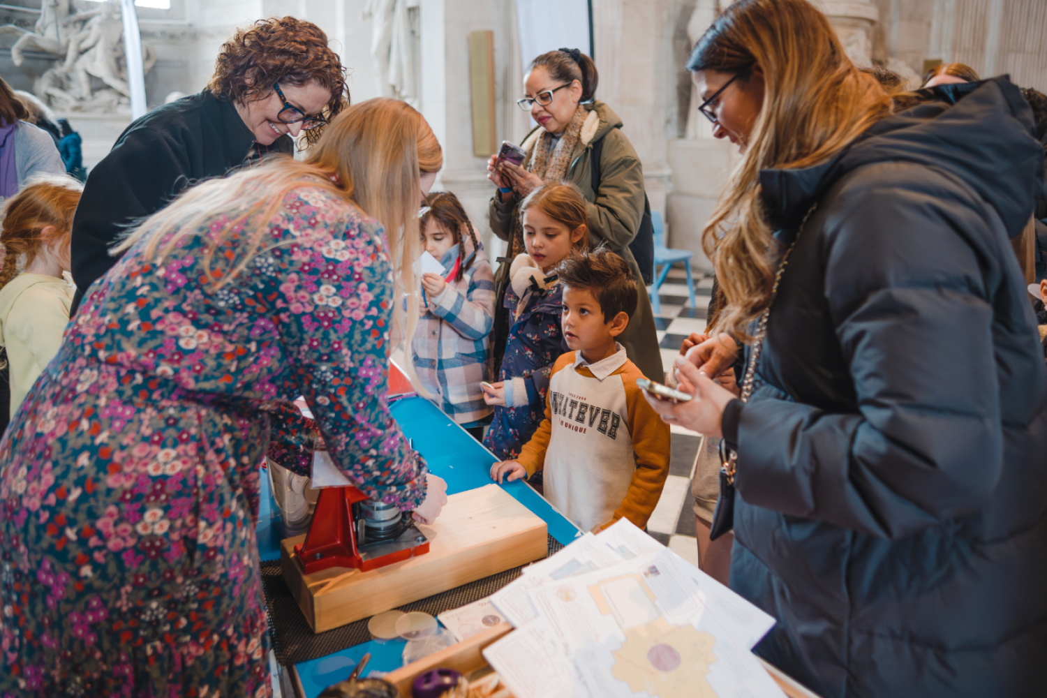 Members of the Learning team speak to children at Messy Cathedral 2025.