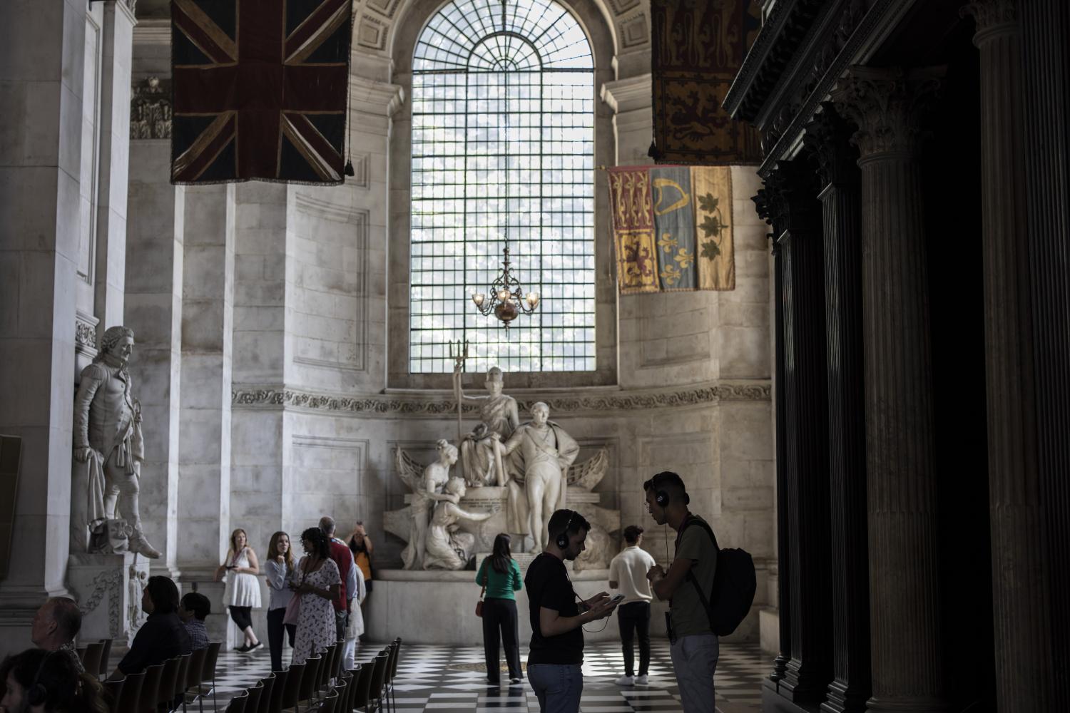 Visitors look around in the South Transept.
