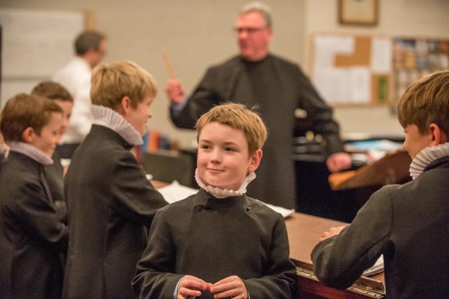 chorister smiling choir music