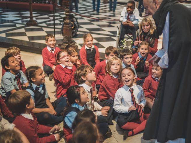 children smiling and laughing on schools trip