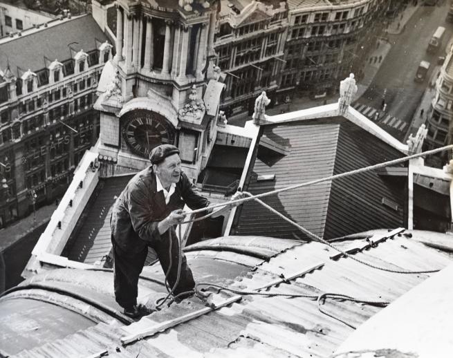 A Friend of St Paul's Cathedral working on the roof of the building