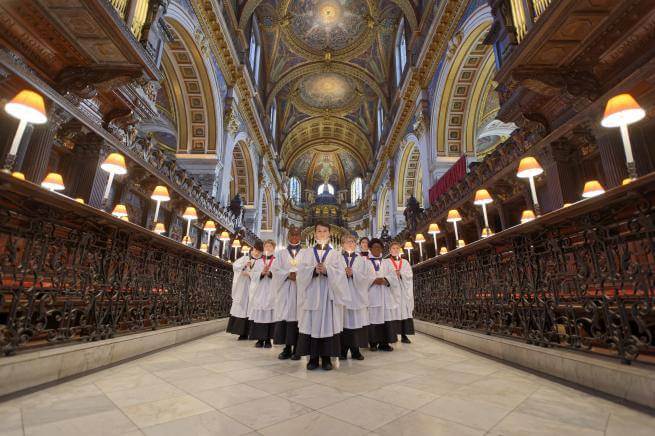 Choristers stand in the Quire at Christmastime