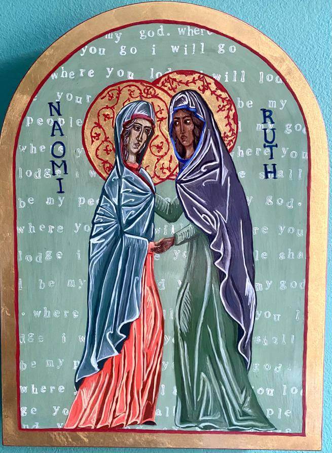 A picture of a contemporary painted icon of Ruth and Naomi. Two women greet each other, looking into each other’s eyes. The word Ruth is written vertically on the right and the word Naomi is written vertically on the left. They are framed in an arched gold frame with a red line inside it, and the background is pale green with words from Ruth’s speech to Naomi from the book of Ruth painted on it.