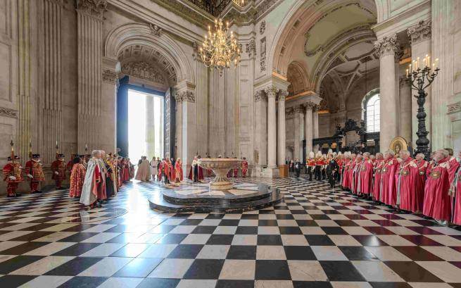 Their Majesties The King and Queen with the Dean and Bishop of London at the OBE Service