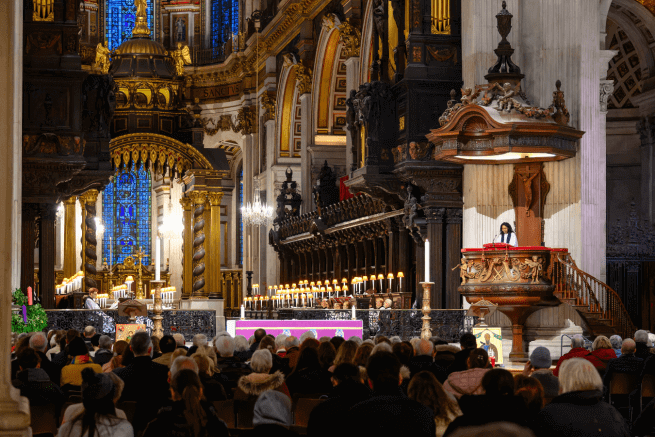 a photo of the Quire at St Paul's Cathedral with a full congregation seated during a service