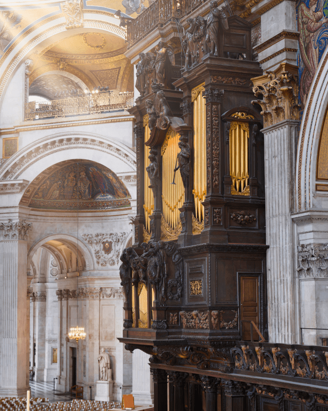 The organ pipes at St Paul's, lit by sunbeams from the Dome.