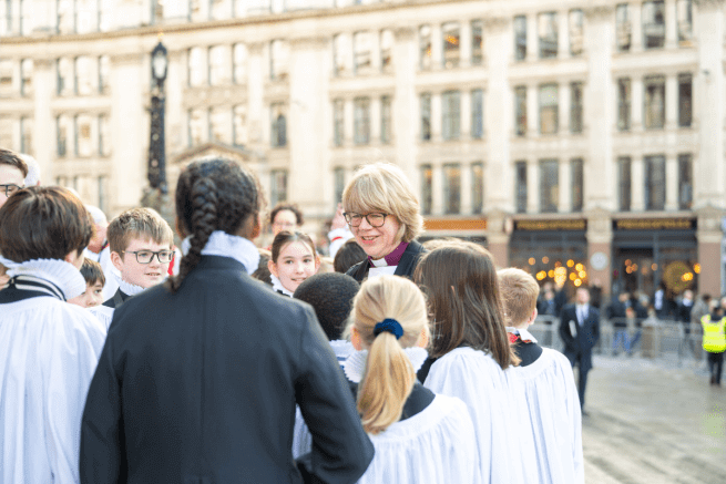 Archbishop Sarah speaks to the Choristers on the West Steps