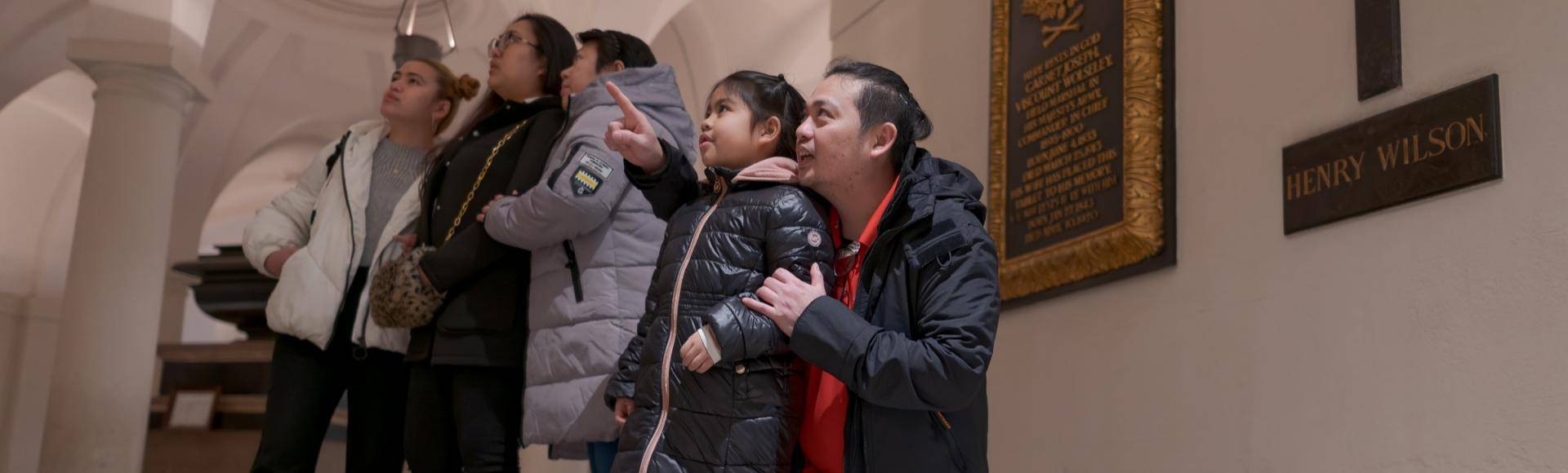 family exploring the crypt 