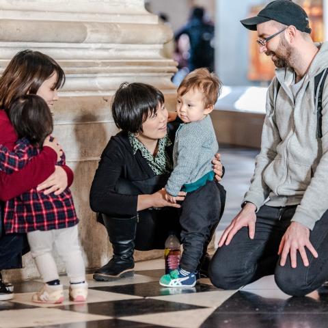 young family tourists smiling toddler