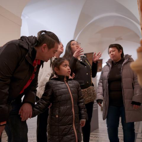 family exploring the crypt