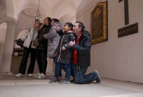 family exploring the crypt