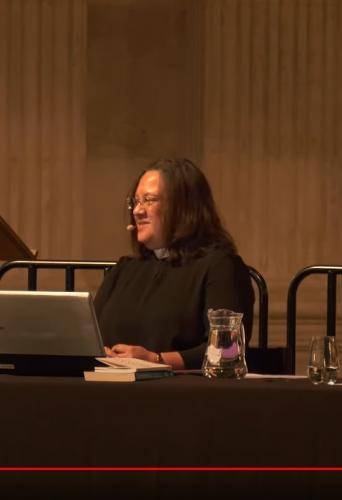 John Swinton, Rowan Williams and Tricia Hillas on stage at St Paul's Cathedral