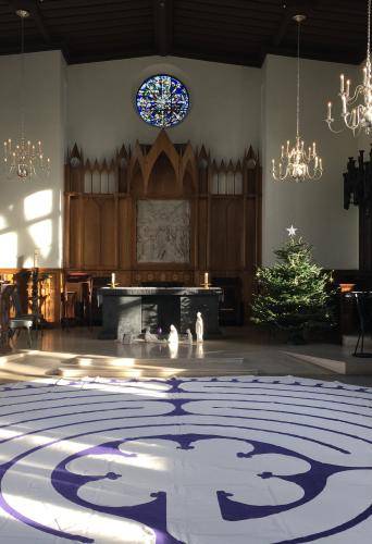 The interior of the Chapel at the Royal Foundation of St Katharine with a labyrinth laid out on the floor