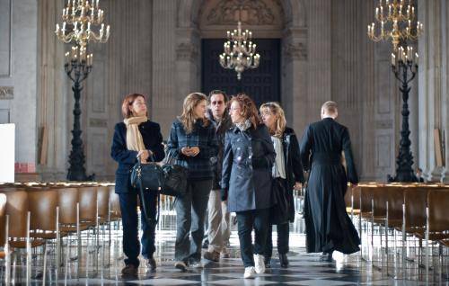 visitors walking the nave women tourists