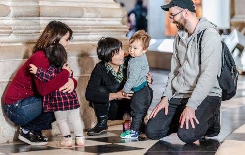 young family tourists smiling toddler 