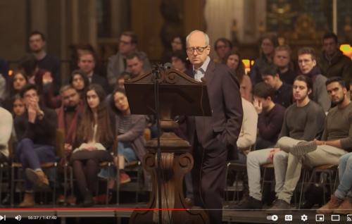 Michael Sandel speaking in front of a group of students at St Paul's Cathedral