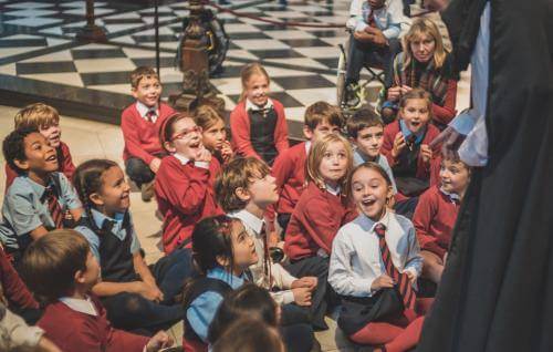 children smiling and laughing on schools trip