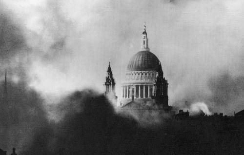 A photograph of St Paul's Cathedral dome surrounded by smoke