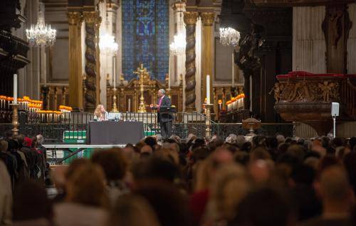 Bishop Curry and Paula Gooder on stage at an Adult Learning event in the cathedral