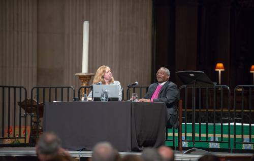 Paula Gooder and Bishop Michael Curry talk to each other on stage at St Paul's Cathedral