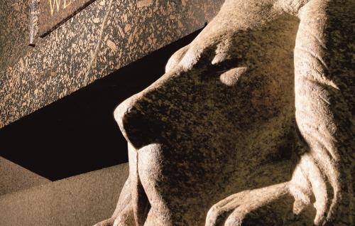 The granite lion supporting the tomb of the Duke of Wellington in the crypt