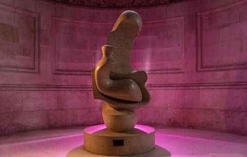 Henry Moore's sculpture bathed in pink light
