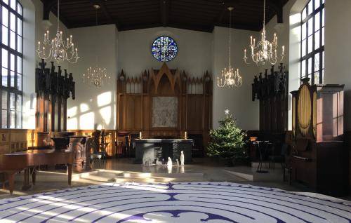 The interior of the Chapel at the Royal Foundation of St Katharine with a labyrinth laid out on the floor